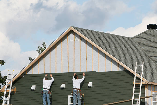 Professional Emergency Siding Repair technician working in Blue Point, NY
